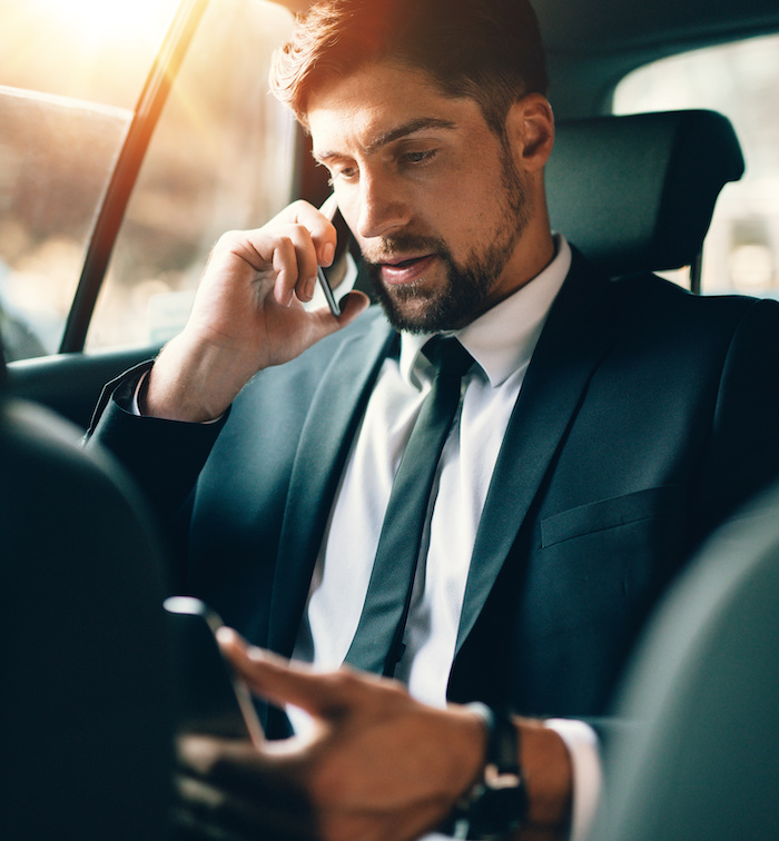 Young business working during travelling to office Corporate transport service in Orlando